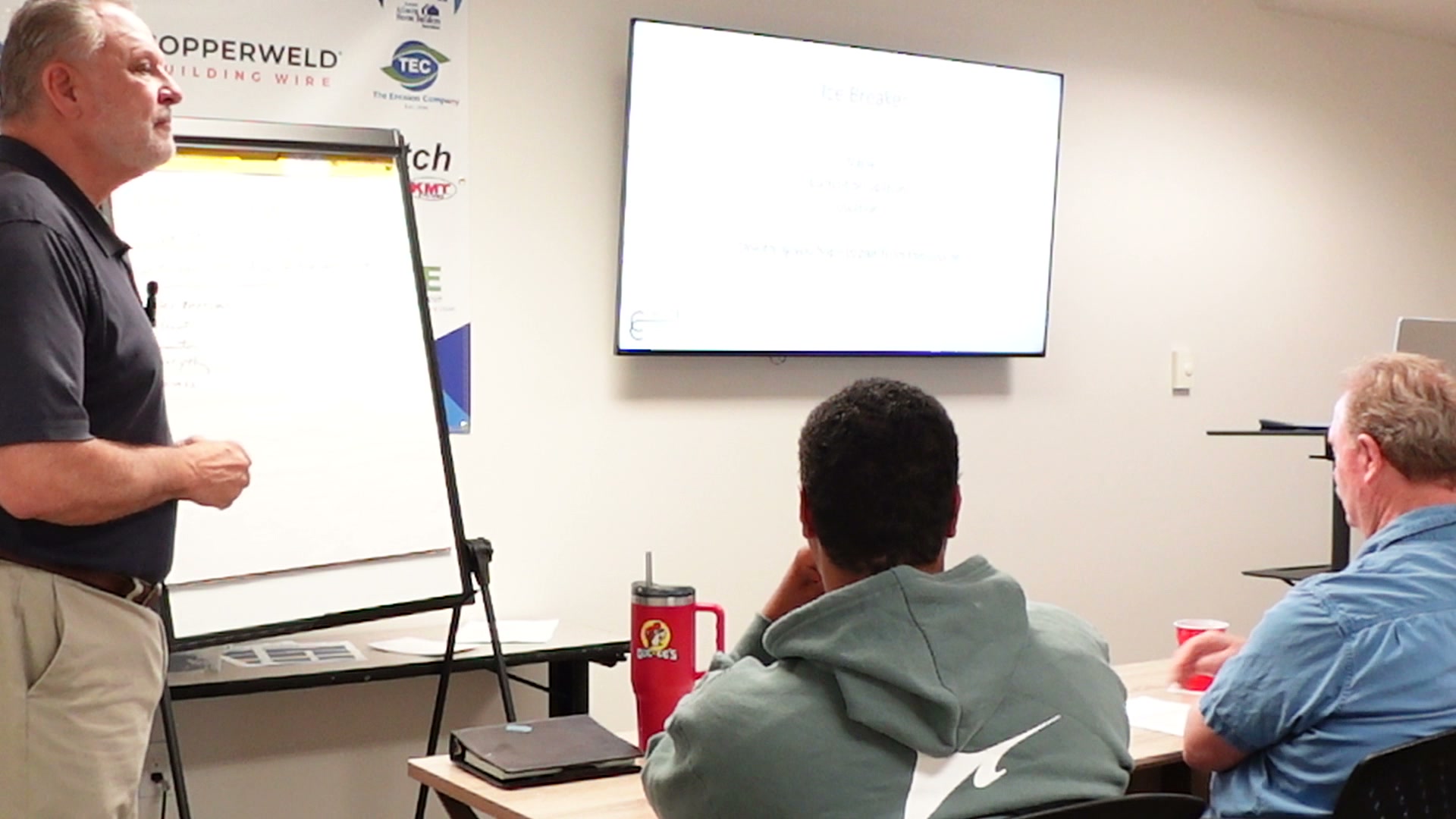 Bobby Mink working through a process at the flip chart